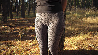 Girl Teases Her Big Cameltoe in Leopard Leggings Outdoors