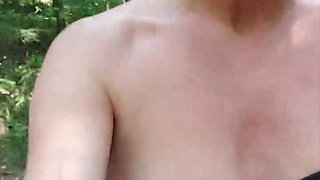 Julie strips naked outside and squirts