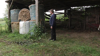 The old farmer's wife waits her husband to be fucked in the barn