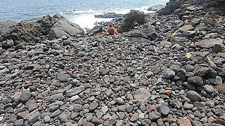 Short-haired tattooed girlfriend gives outdoor beach blowjob