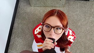 Cute nerdy redhead sucks a giant black cock and swallows it all the way to the base