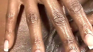 Gorgeous ebony skinned Angel Eyes fucks a big black cock