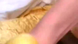 Thick yellow strapon goes into this whores asshole