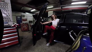 Cute Female Mechanic Plays Solo in the Car Service