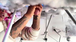 Pierced and tattooed boy sucking black cock from glory hole