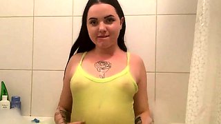 Bubble Bath Time for This Tattooed Brunette