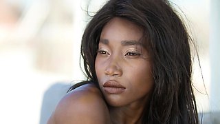 Confident ebony teen shows her dark cunt