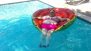 Short Video of BBW Nurse Vicki Floating on Her Huge Watermelon