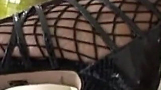 Black Slut in Fishnet Stockings and Big Tits Fucked by a Huge Black Cock