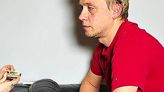 Femdom. He Smokes a Cigarette and a Busty Woman Fucks Him Hard in the Ass with a Strapon.