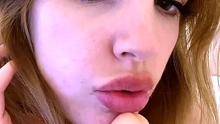 Close up with teen blonde sex doll rubbing her cunt