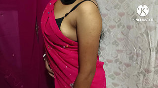 Wabi wearing a red sari