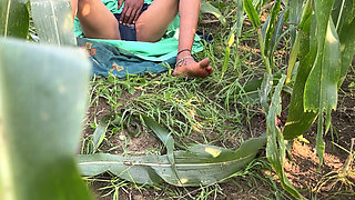 The sister-in-law of the village shows her figure in the open field, a tight-bodied, Indian-looking woman.