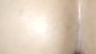 Married Woman Swallowing Milk From the Fountain and Smiling