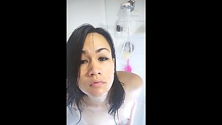 Small titted brunette Sharron with glasses masturbates