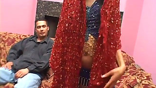 Hot ass Indian chick sucks and fucks two fat cocks in the bedroom