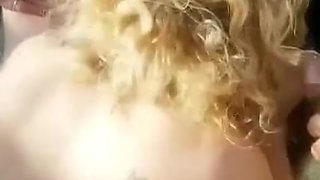 Orgie en exterieur elle suce en bukkake
