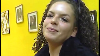 Fabulous brunette with curly hair wants a new tattoo