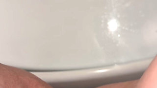 Quick Piss in the Toilet in Casual Clothes & Flip Flops