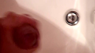 Nicely jerked off in the bathroom