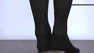 The Slave's Orgasm Under Mistress Cleo's Stocking Feet