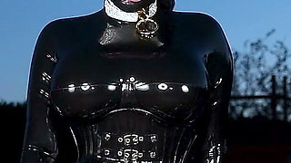 Rubber Doll Cock Teasing Rubber Bound Sub Outdoors