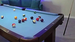 Foursome Shenanigans on a Pool Table