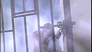 Sexy babe in heels keeps her slave in prison for her sexual needs