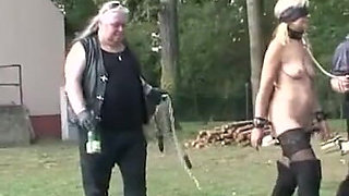 Humiliates stretching bottle in ass