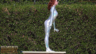 Bending in a Silver Spandex Suit
