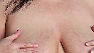 POV: My Stepmom Is Smoking a Cigarette and Starts Playing with Her Huge Tits Until Milk Comes Out.