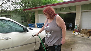 Sexy Mature bbw redhead  Nurse Vicki washes her car!