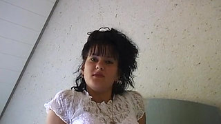 Horny girl lays in bed finger fucking herself and stroking clit