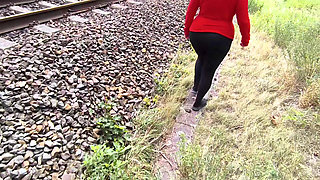 Red Tits Beside the Train Station