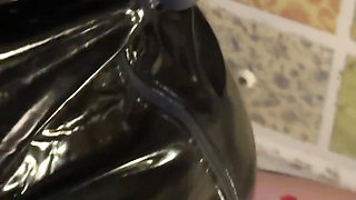 MILF in Bitbit Gag in Chained Latex Dress