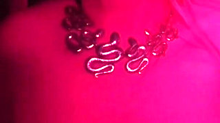 MILF with 2 Young Guys in a Swinger Club