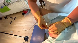Dominatrix mistress April - clinical cock stitching