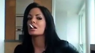 Smoking Hot Brunette Milf in Latex Catsuit and Boots