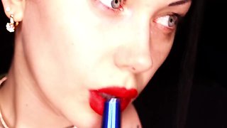 4K Applying crimson lip liner and smoking hookah on black background