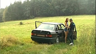 Mature Brunette Devours Cock in Wild Outdoor Group Bang
