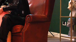 German Rubber Slut Get`s Spanked While She Is Bend Over the Knee