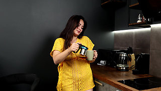 Amelia Ost teasing herself with natural breasts in yellow dress