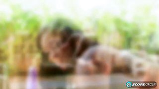 Soloing ebony babe Thalia Tate sticks a purple dildo in her shaved pussy