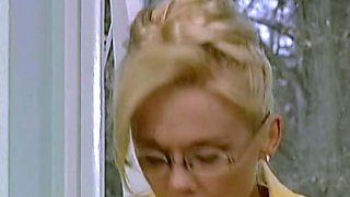 Busty lady in yellow and glasses gets double dicked