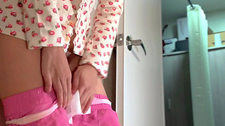 Tiny Asian Babe Standing Over Toilet Bowl