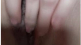 Woman spreads her thighs, inviting a lover to feast on her sweetness
