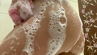 the dirty slut washed her sweet lustful body in foam in the shower and spread her ass