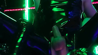 The rubber Domme the giant dildo and the gimp