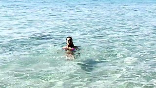 Bodacious bikini model showing off perfect curves outdoors