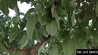 Cute girl in the hat rubbing her pussy out in the public place